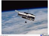 Poster 24"x18" - Hubble Images - Hubble Orbiting Earth